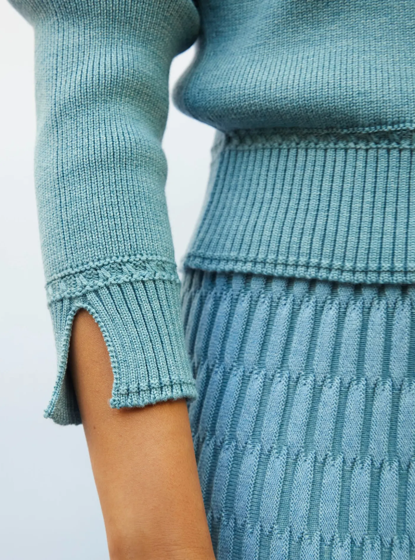 pull droit détails tressés