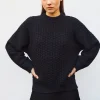 pull loose maille entrelacée